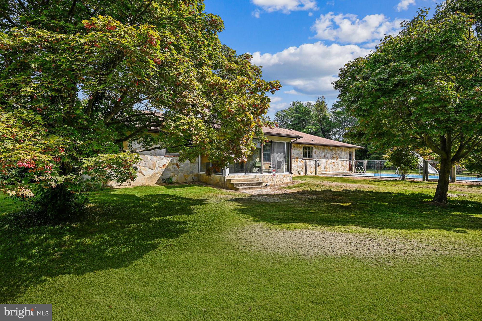 1836 Cherry Road Annapolis, MD 21409 - Photo 15 of 82 Manicured Surrounds with Rear Fenced Pool Area