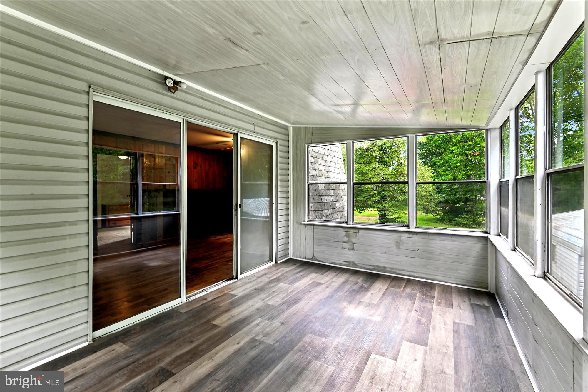 1836 Cherry Road Annapolis, MD 21409 - Photo 59 of 82 Slider Spilling Out to Screened Porch