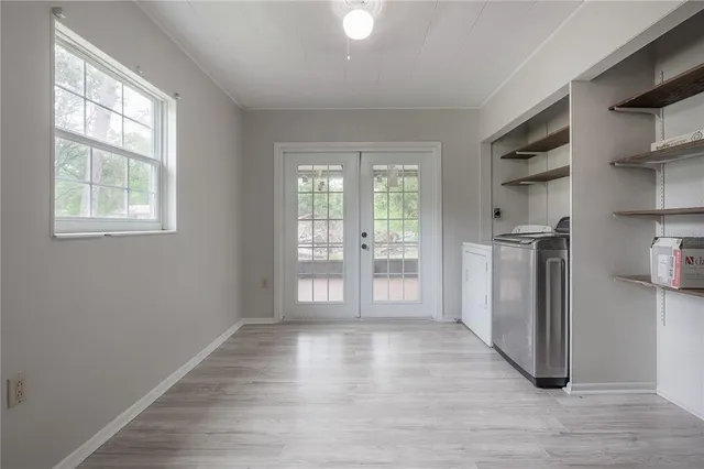 a view of a kitchen with a sink dishwasher and a refrigerator