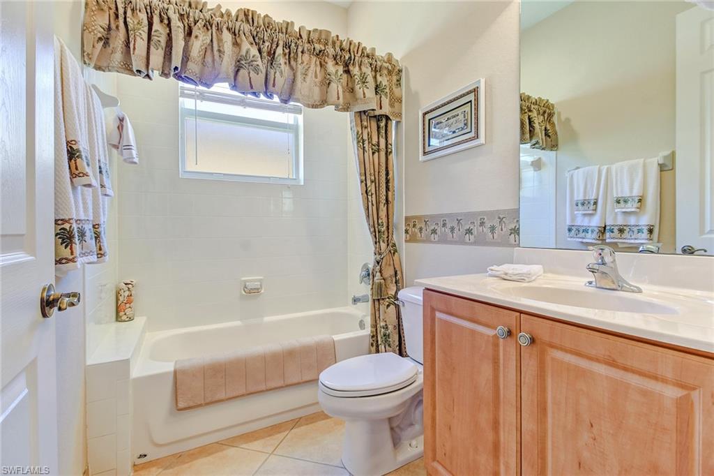 9258 Springview Loop Estero, FL 33928 - Photo 15 of 35 a bathroom with a sink toilet and shower