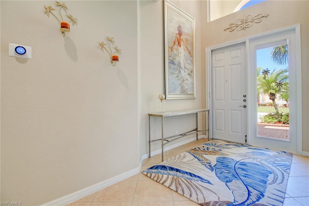9258 Springview Loop Estero, FL 33928 - Photo 3 of 35 a bedroom with a bed and a window