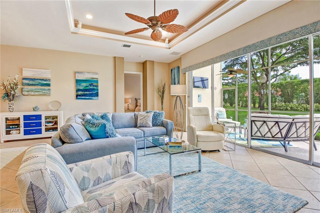 9258 Springview Loop Estero, FL 33928 - Photo 8 of 35 a living room with furniture and a large window