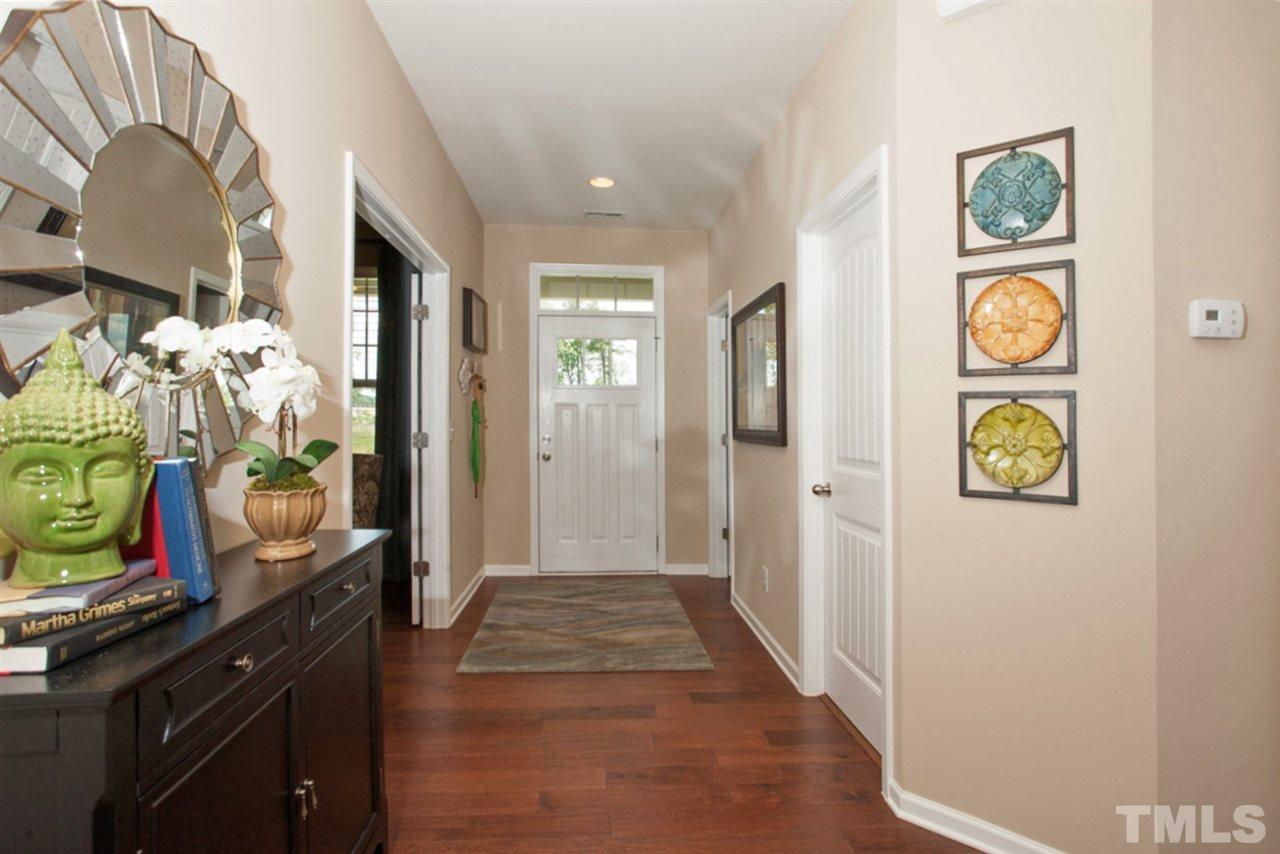 1516 Bentons Ridge Drive Raleigh, NC 27610 - Photo 3 of 25 a view of a hallway to rooms and stairs