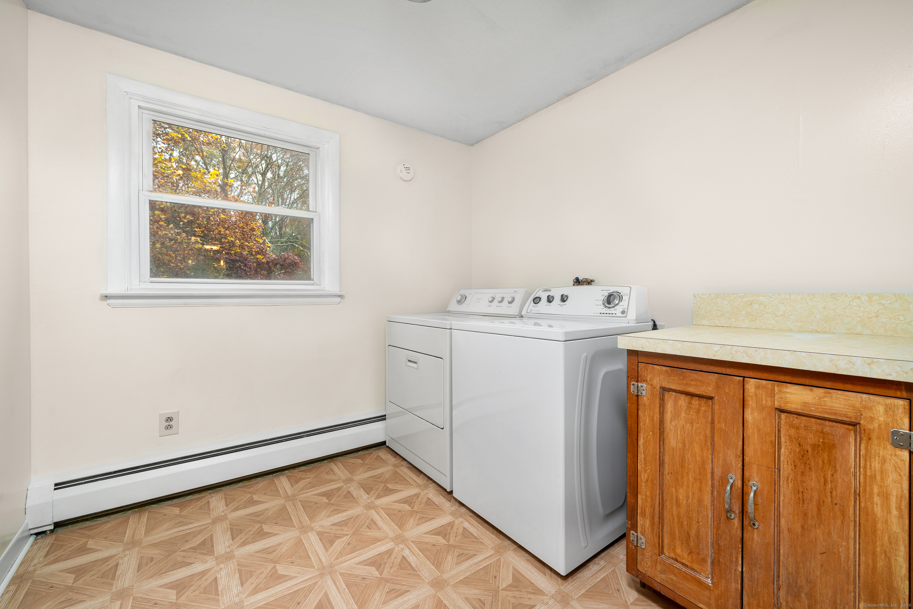 110 Coles Road Cromwell, CT 06416 - Photo 32 of 40 a utility room with dryer and washer