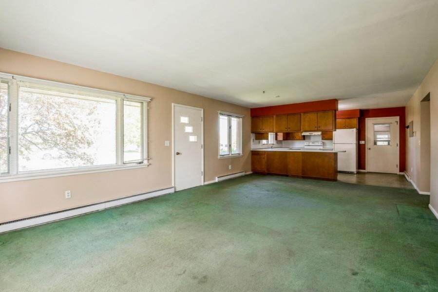 7281 Hillandale Road Sodus, MI 49126 - Photo 3 of 14 03_7281HillandaleRoad_91_KitchenLivingRo
