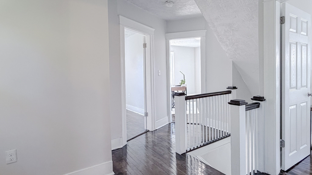 4 Longfellow Road Worcester, MA 01602 - Photo 18 of 36 a view of a hallway with a room