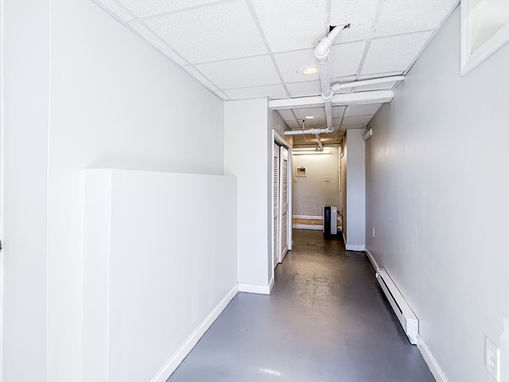 4 Longfellow Road Worcester, MA 01602 - Photo 28 of 36 a view of a hallway with a white walls