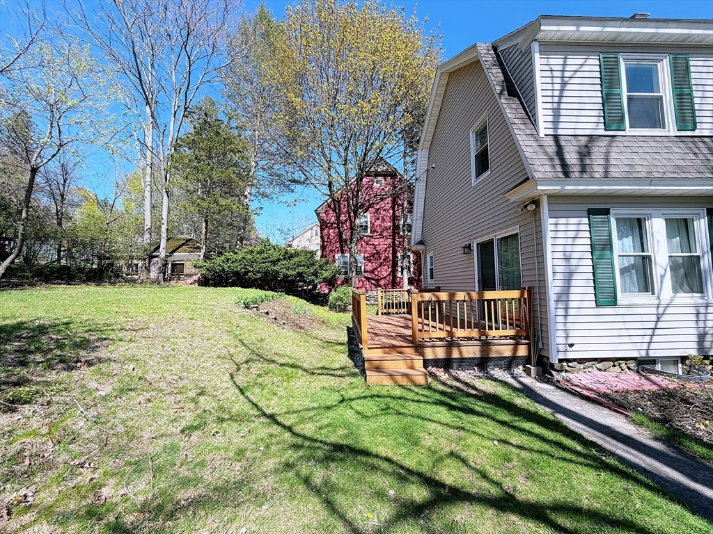 4 Longfellow Road Worcester, MA 01602 - Photo 34 of 36 a view of a house with a yard and wooden fence