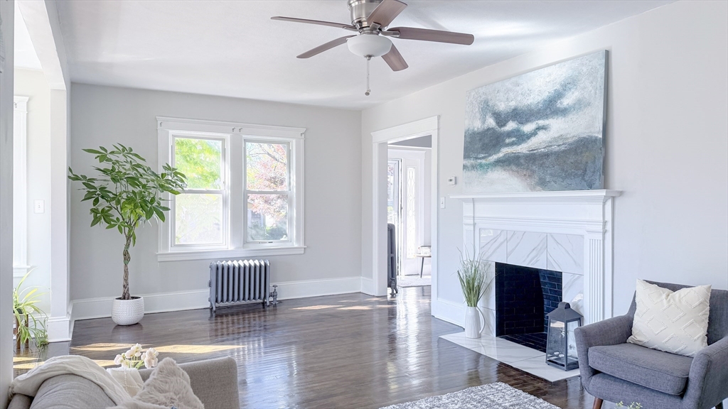 4 Longfellow Road Worcester, MA 01602 - Photo 8 of 36 a living room with furniture and a fireplace