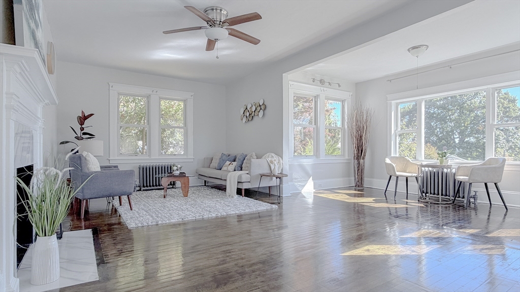 4 Longfellow Road Worcester, MA 01602 - Photo 10 of 36 a living room with furniture and a large window