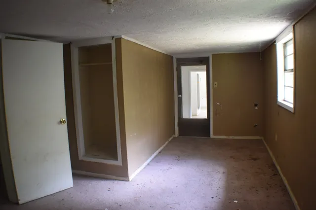 a view of a hallway with a small space