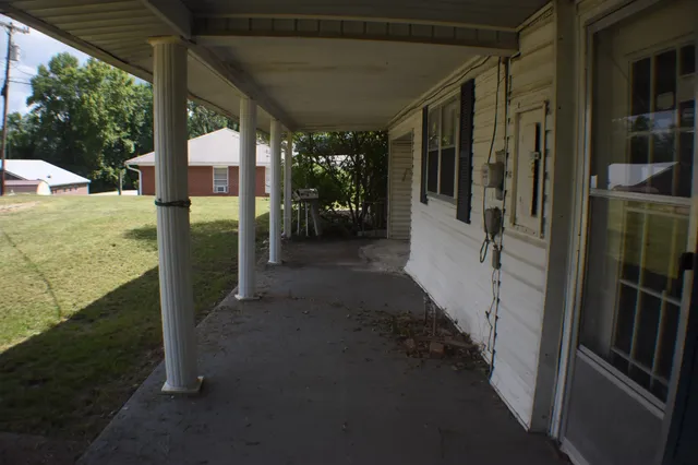 a view of a backyard with a garden