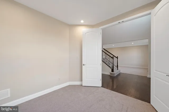 a view of an entryway with a staircase