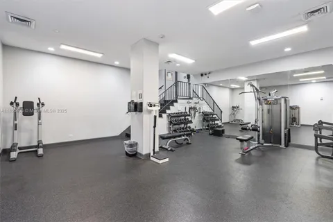 a view of a room with gym equipment