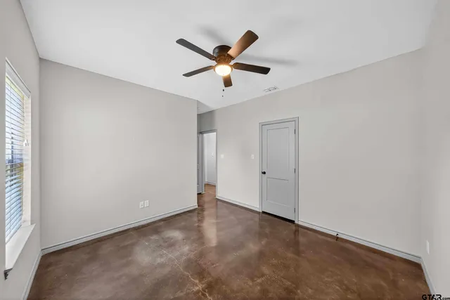a view of ceiling fan with window
