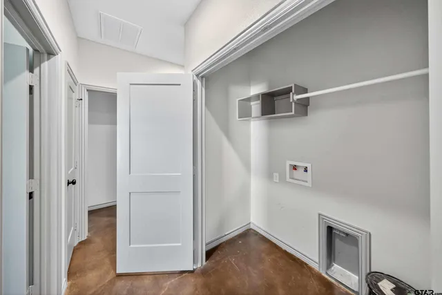 a view of a hallway with workspace