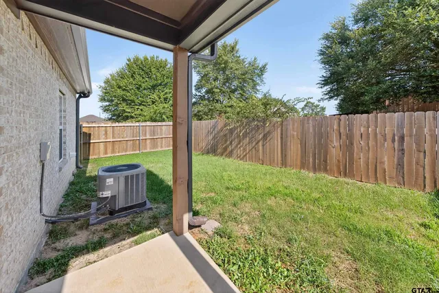 a view of a backyard with a garden
