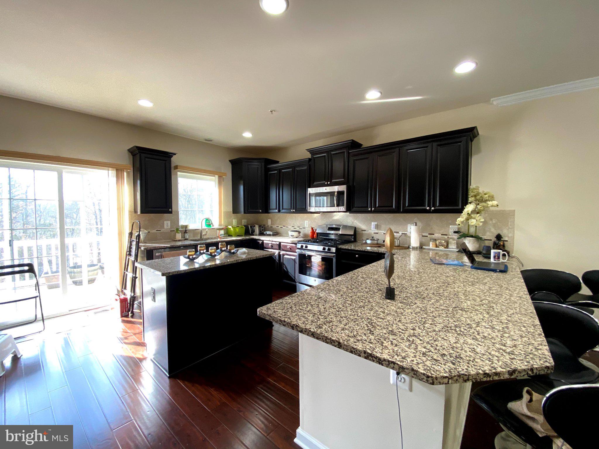 7014 Foxton Way Hanover, MD 21076 - Photo 4 of 29 Modern kitchen with elegant finishes.