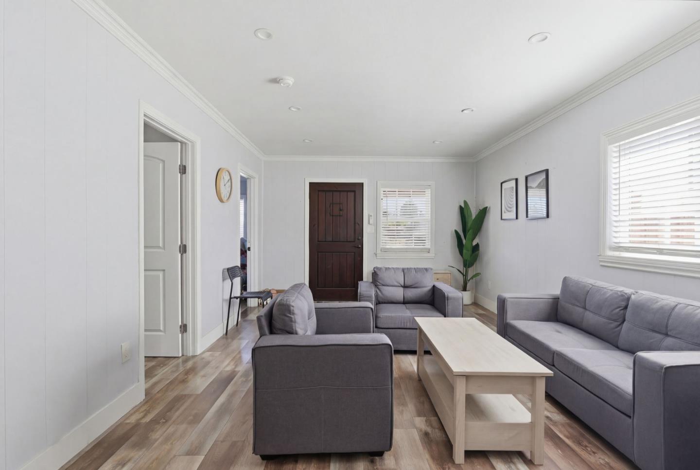 83 North King Road San Jose, CA 95116 - Photo 16 of 51 a living room with furniture and a window