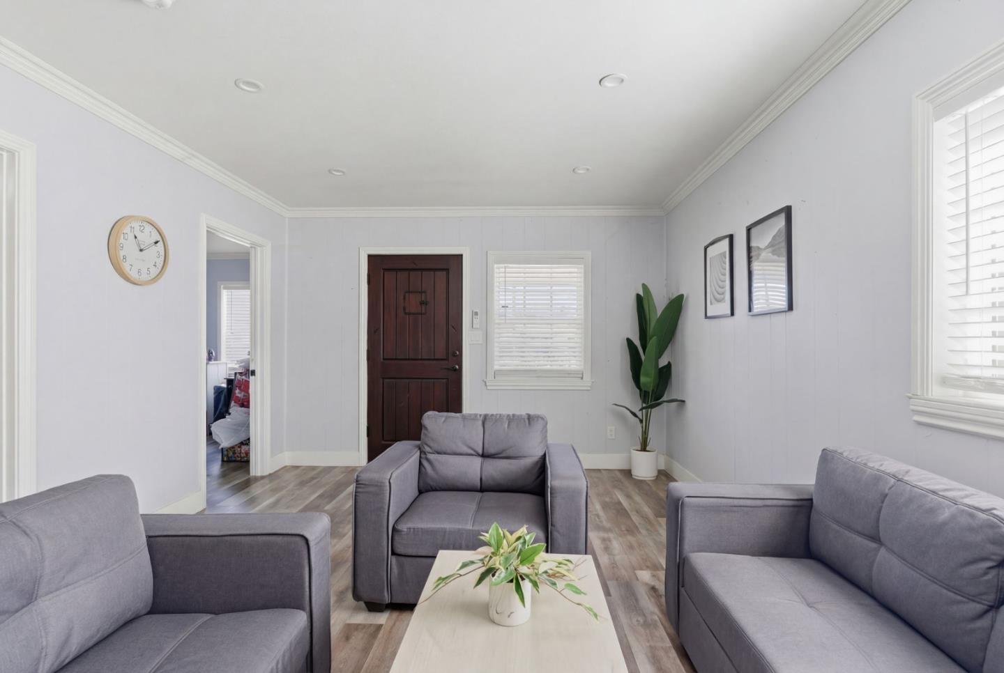 83 North King Road San Jose, CA 95116 - Photo 17 of 51 a living room with furniture or window and a couch