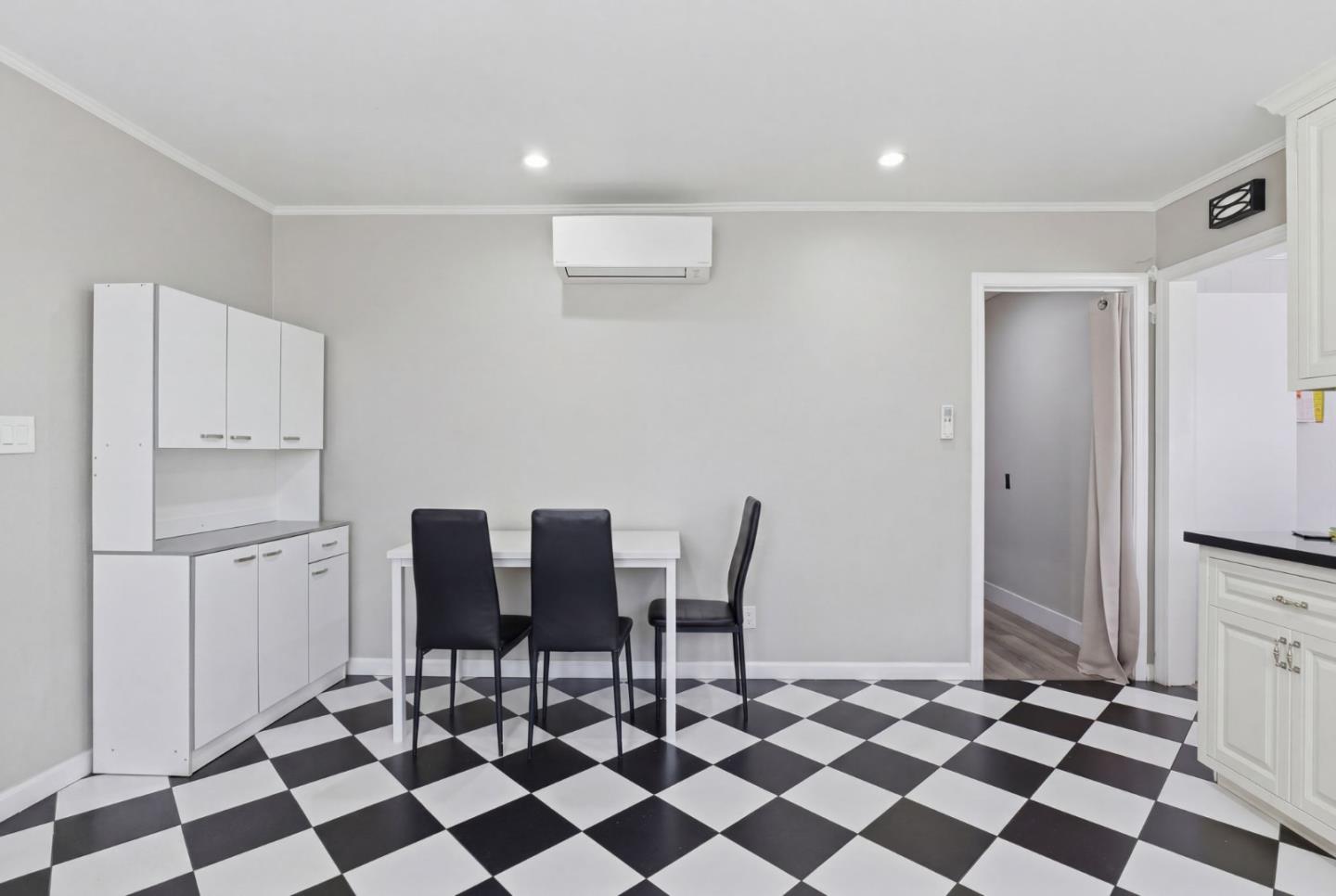 83 North King Road San Jose, CA 95116 - Photo 19 of 51 a black and white checkered floor with a black white checkered floor