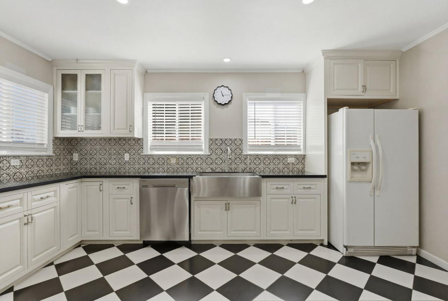 83 North King Road San Jose, CA 95116 - Photo 22 of 51 a kitchen with stainless steel appliances granite countertop a refrigerator and a granite counter tops