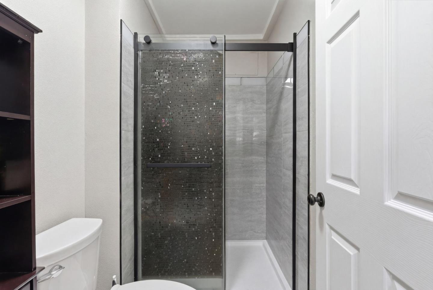 83 North King Road San Jose, CA 95116 - Photo 27 of 51 a bathroom with a shower and a toilet