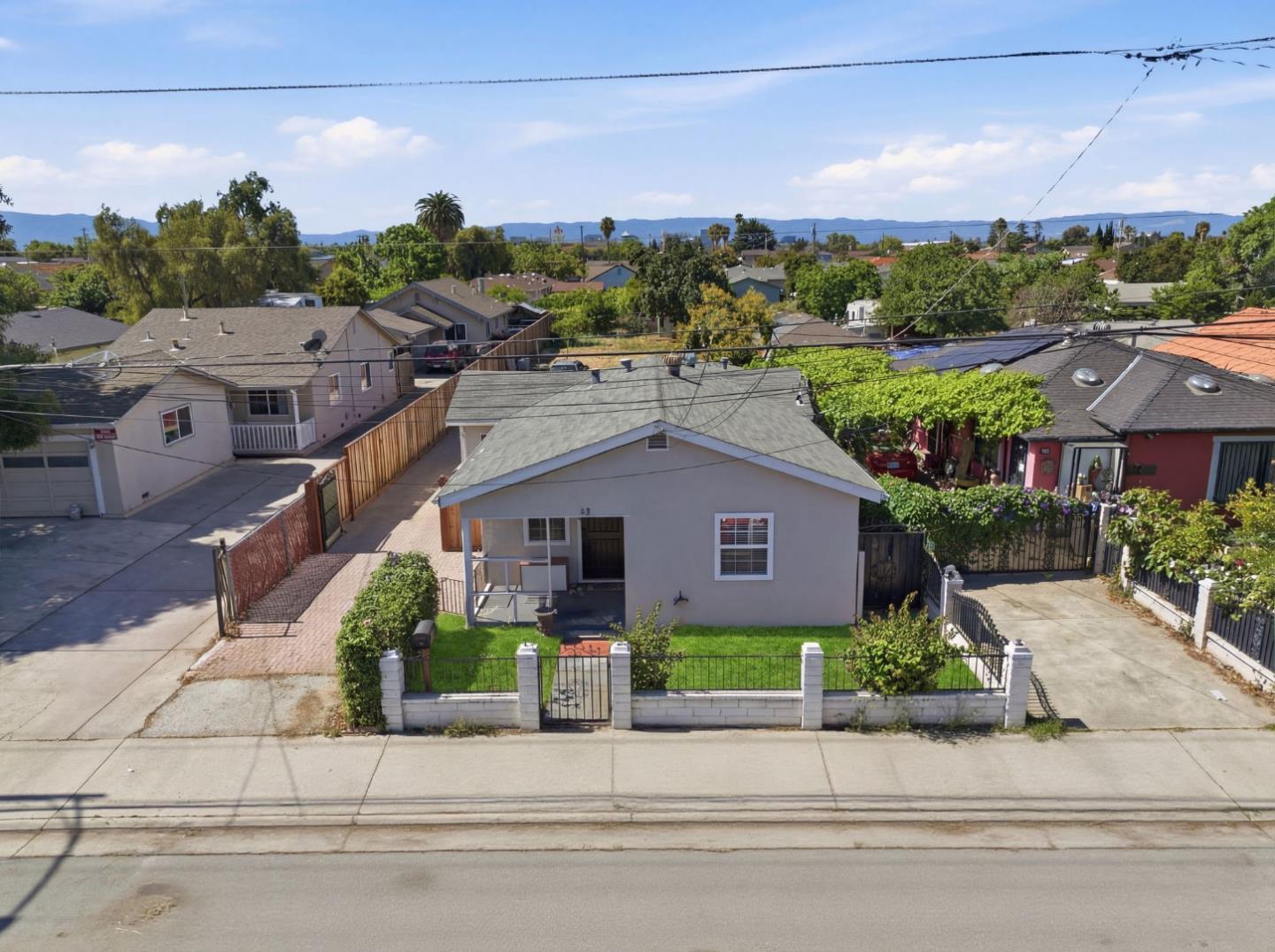 83 North King Road San Jose, CA 95116 - Photo 3 of 51 front view of a house with a street