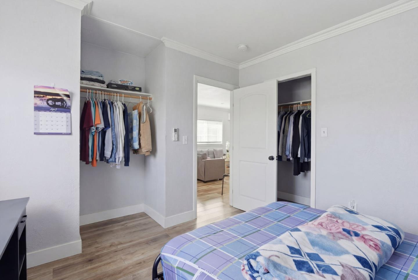 83 North King Road San Jose, CA 95116 - Photo 31 of 51 a bedroom with a bed and wooden floor