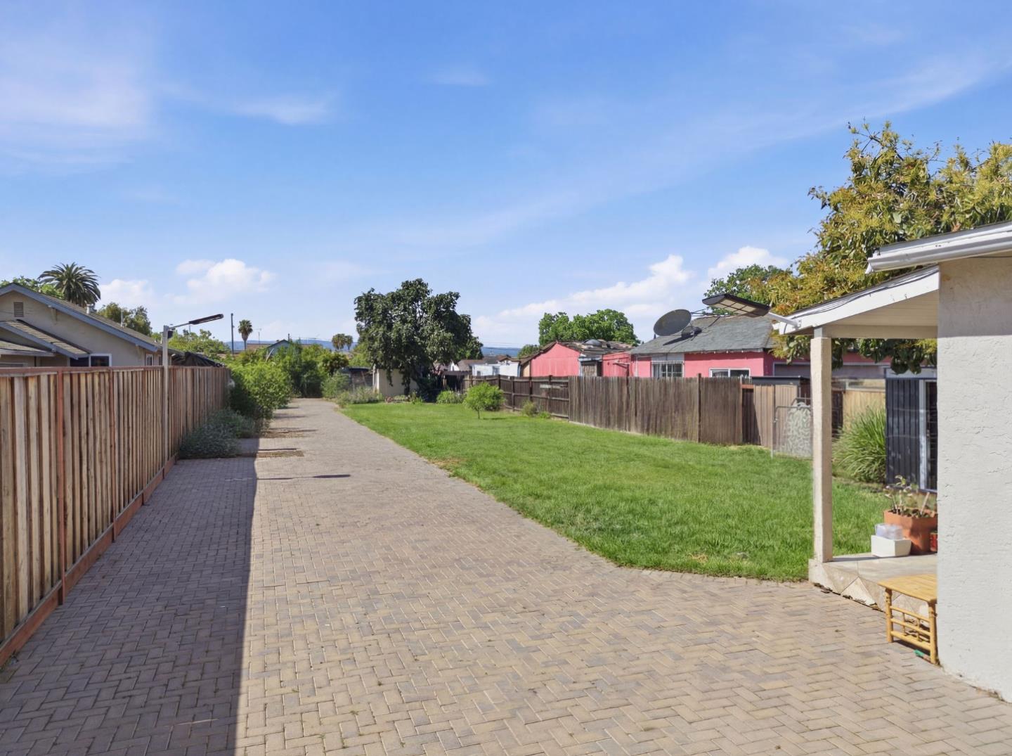 83 North King Road San Jose, CA 95116 - Photo 5 of 51 a view of a park with plants and a trees