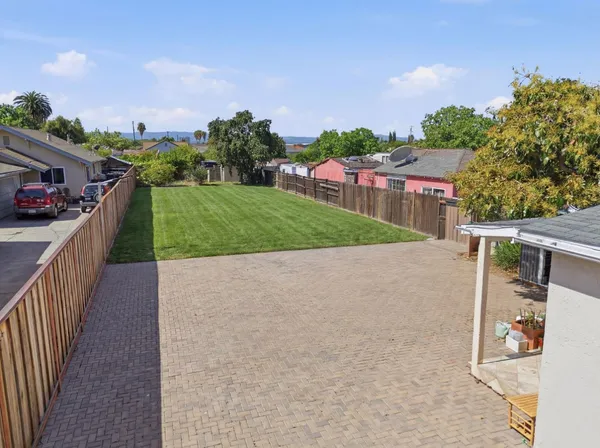 a view of a street with a houses