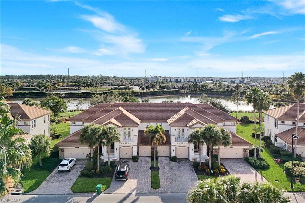 9201 Quartz Lane, Unit 202 Naples, FL 34120 - Photo 32 of 48 a view of a town with big houses