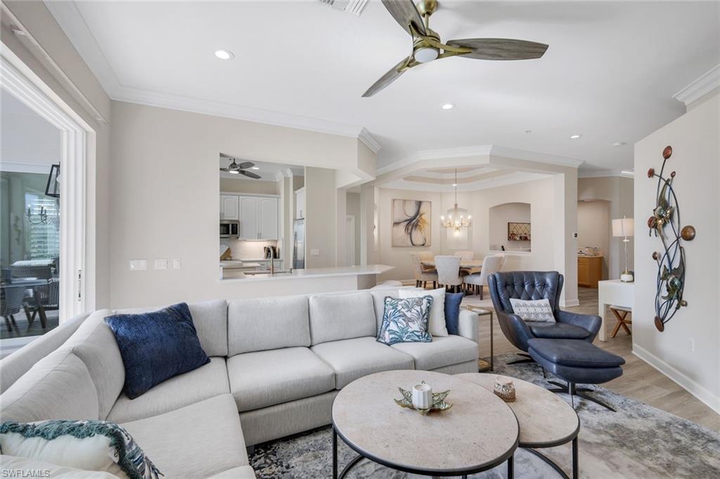 9201 Quartz Lane, Unit 202 Naples, FL 34120 - Photo 10 of 48 a living room with furniture