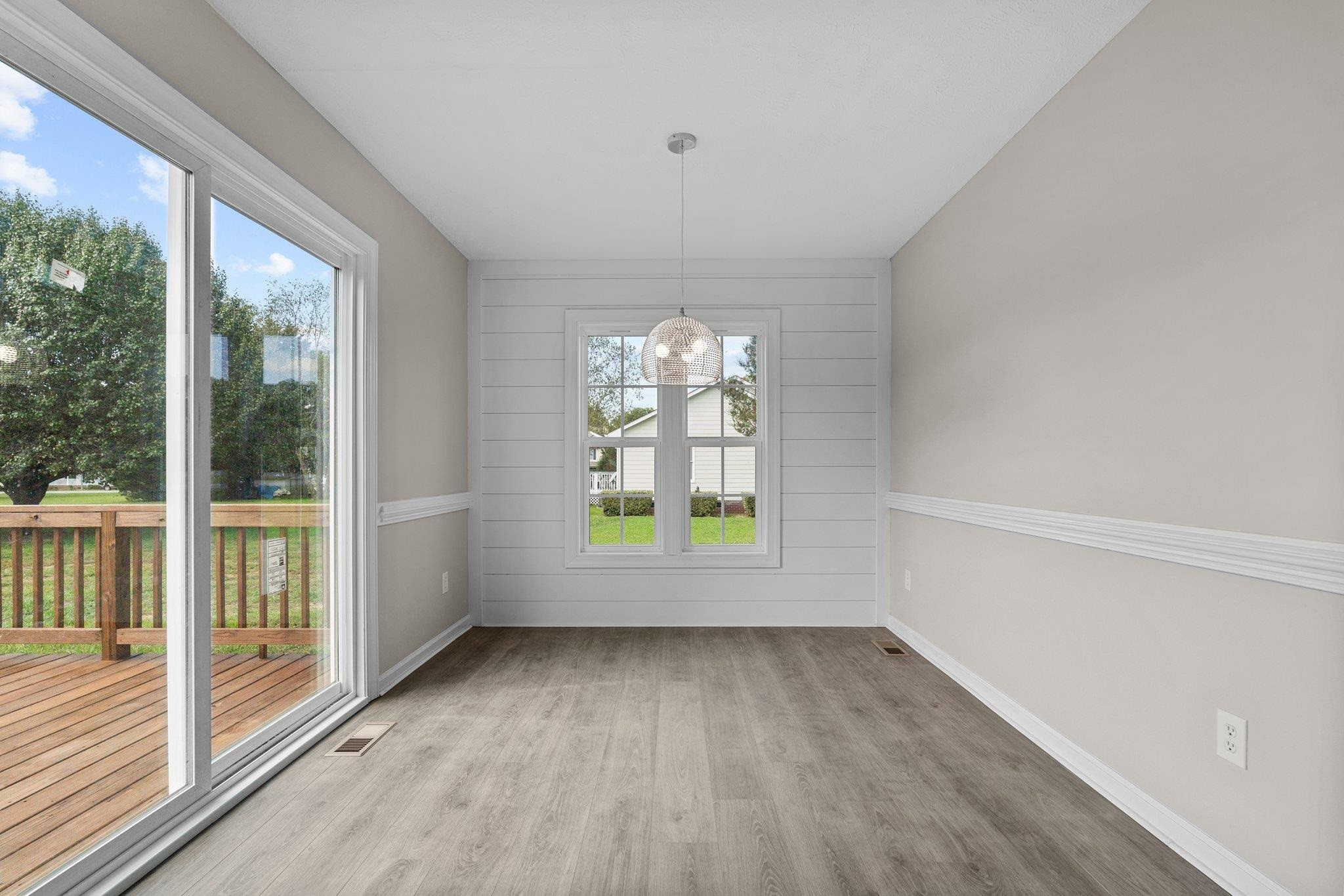 71 Preston Way Lillington, NC 27546 - Photo 5 of 19 an empty room with windows