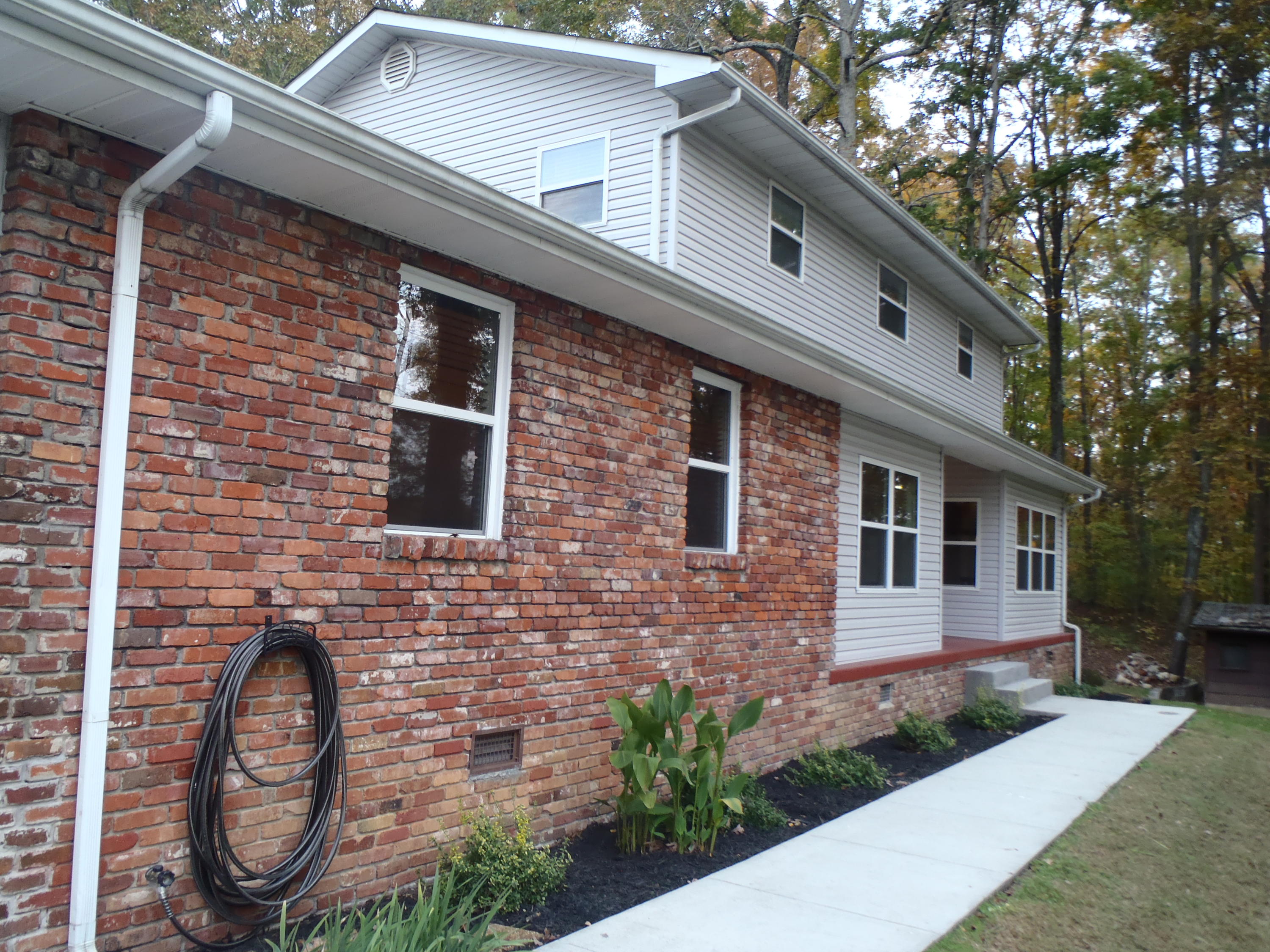 178 Ladd Ridge Circle Kingston, TN 37763 - Photo 3 of 21 Sidewalk leading to front entry