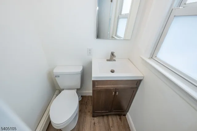 a bathroom with a toilet and a sink