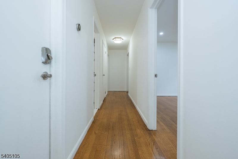 36 East Henry Street Linden, NJ 07036 - Photo 15 of 22 a view of a bathroom from the hallway
