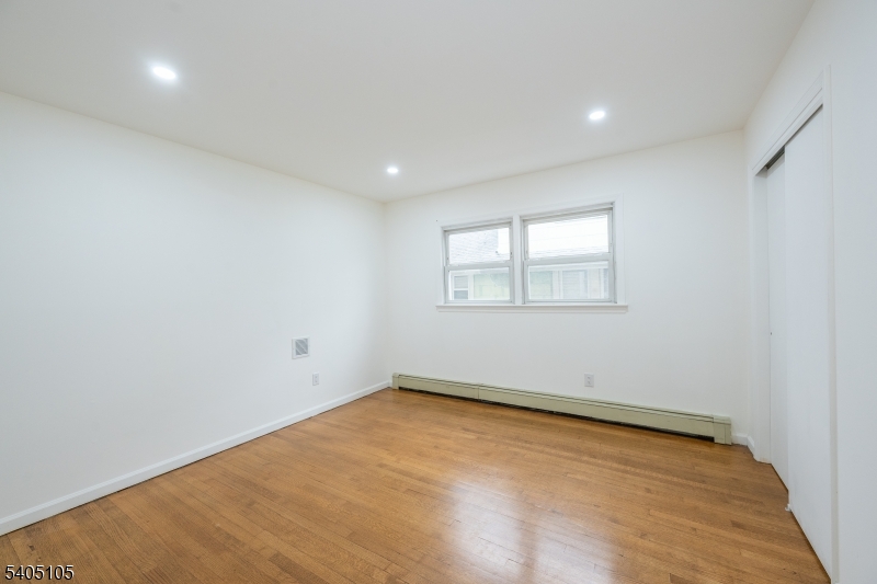 36 East Henry Street Linden, NJ 07036 - Photo 19 of 22 an empty room with a window