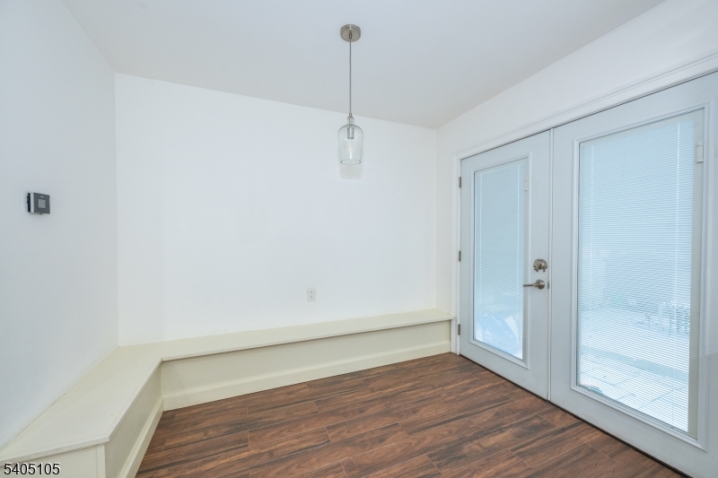 36 East Henry Street Linden, NJ 07036 - Photo 6 of 22 a view of a room with wooden floor and white walls
