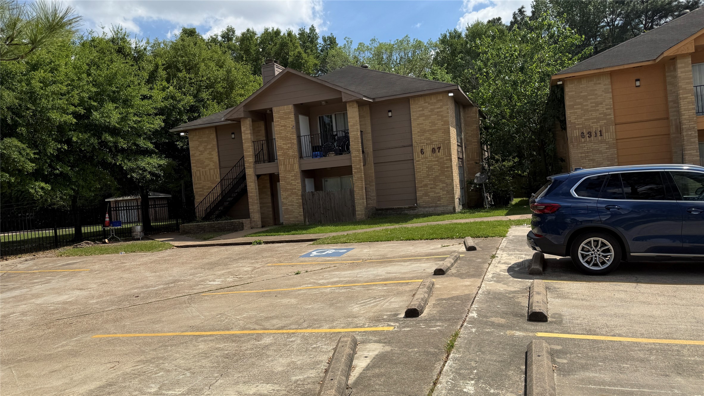6307 West Gulf Bank Road, Unit 16 Houston, TX 77088 - Photo 4 of 9 a view of a car parked in front of a house