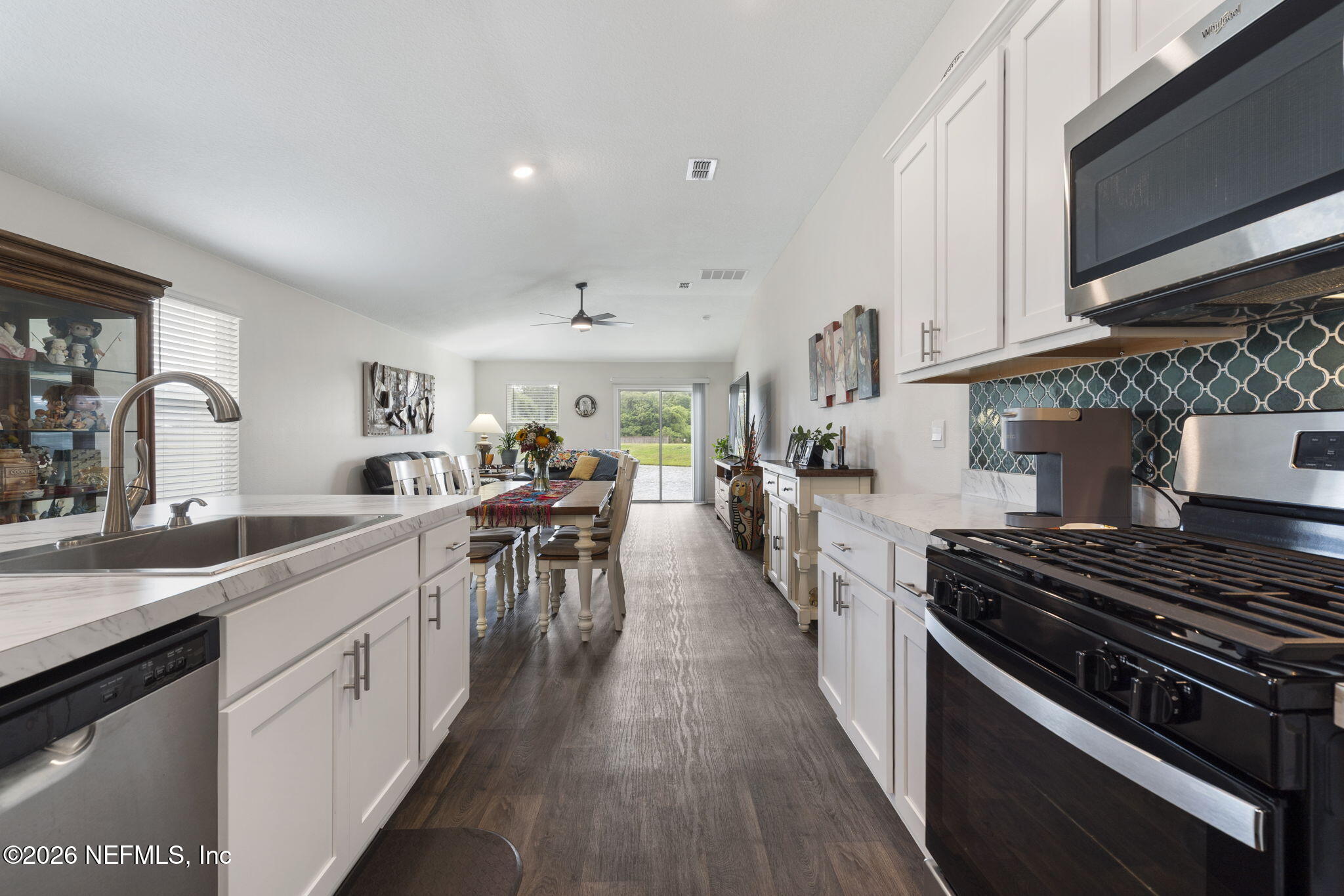 65 Mula Ct Street St. Augustine, FL 32084 - Photo 12 of 38 a kitchen with lots of counter top space and stove