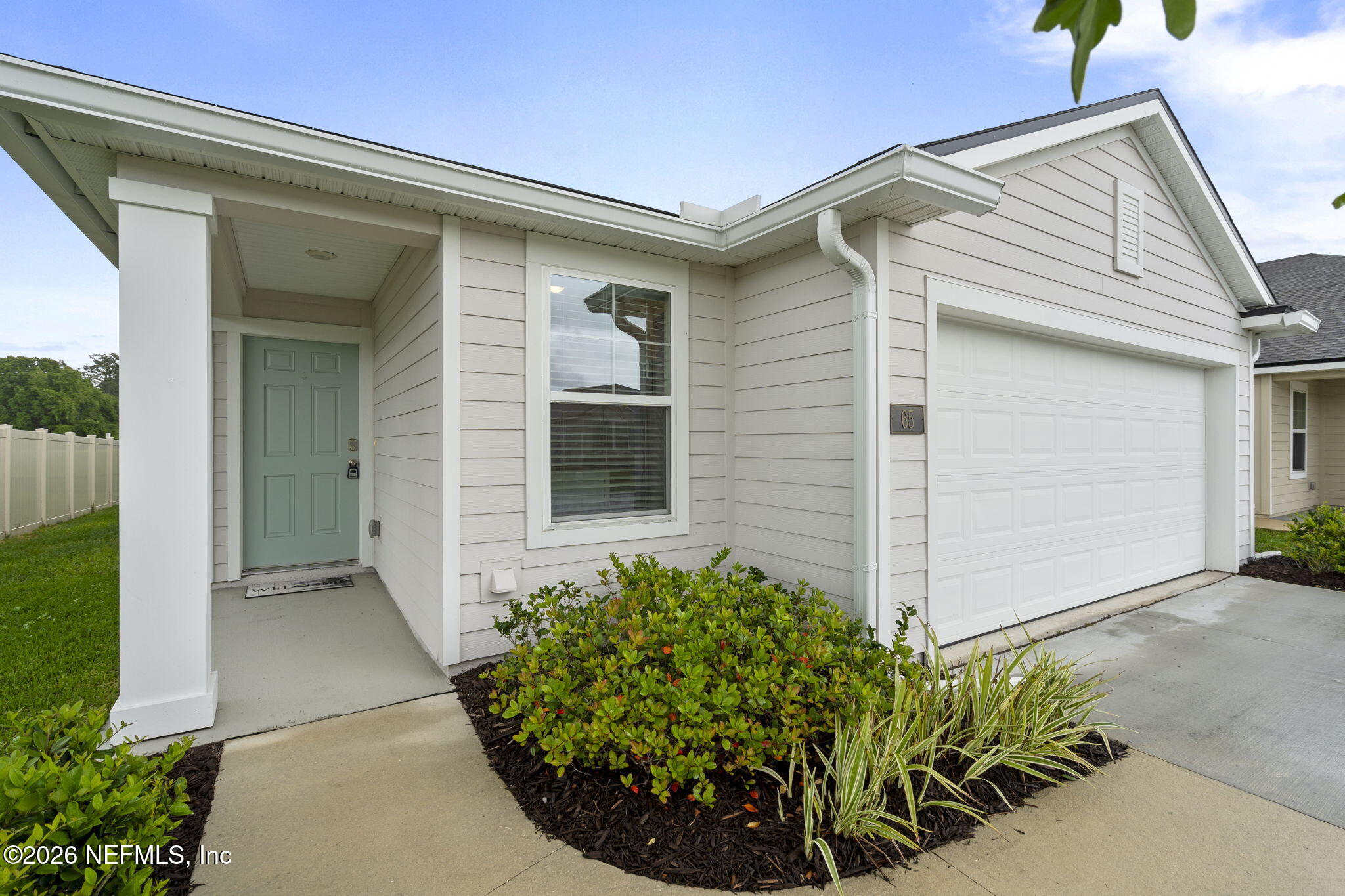 65 Mula Ct Street St. Augustine, FL 32084 - Photo 4 of 38 front view of a house with potted plants