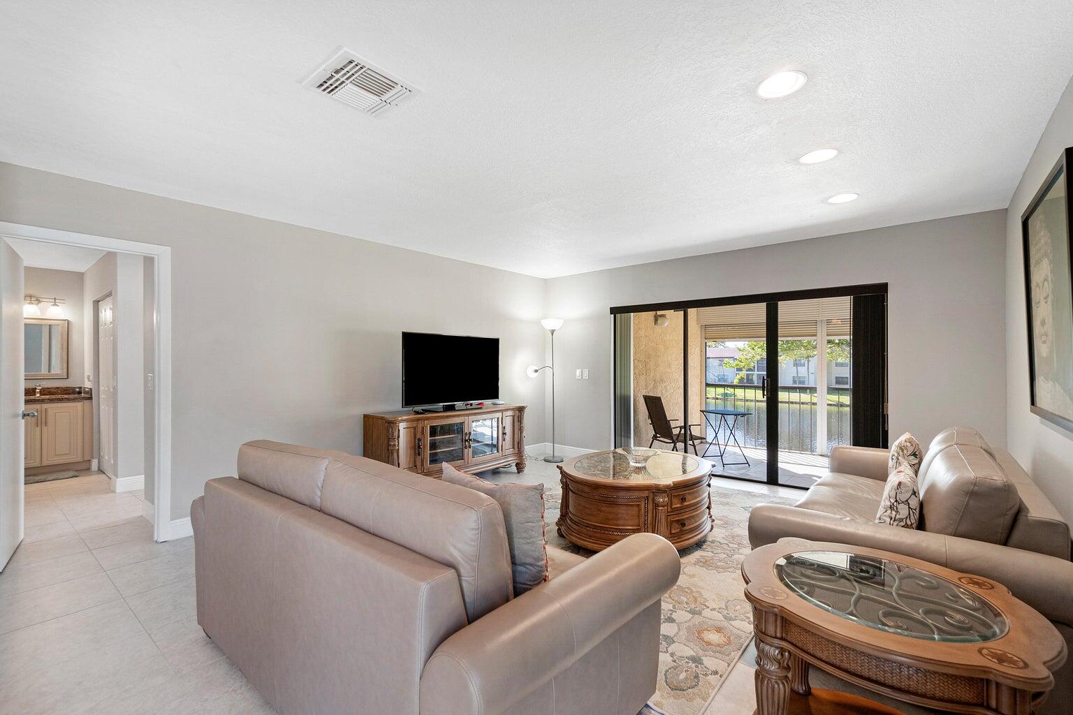 21863 Arriba Real, Unit 8K Boca Raton, FL 33433 - Photo 11 of 26 LIVING ROOM