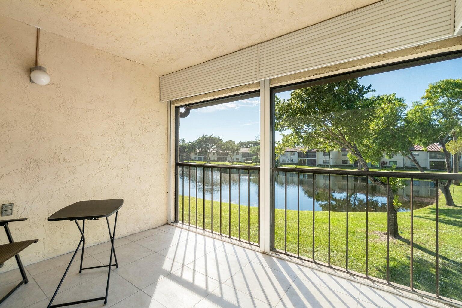 21863 Arriba Real, Unit 8K Boca Raton, FL 33433 - Photo 22 of 26 BALCONY LAKE VIEW