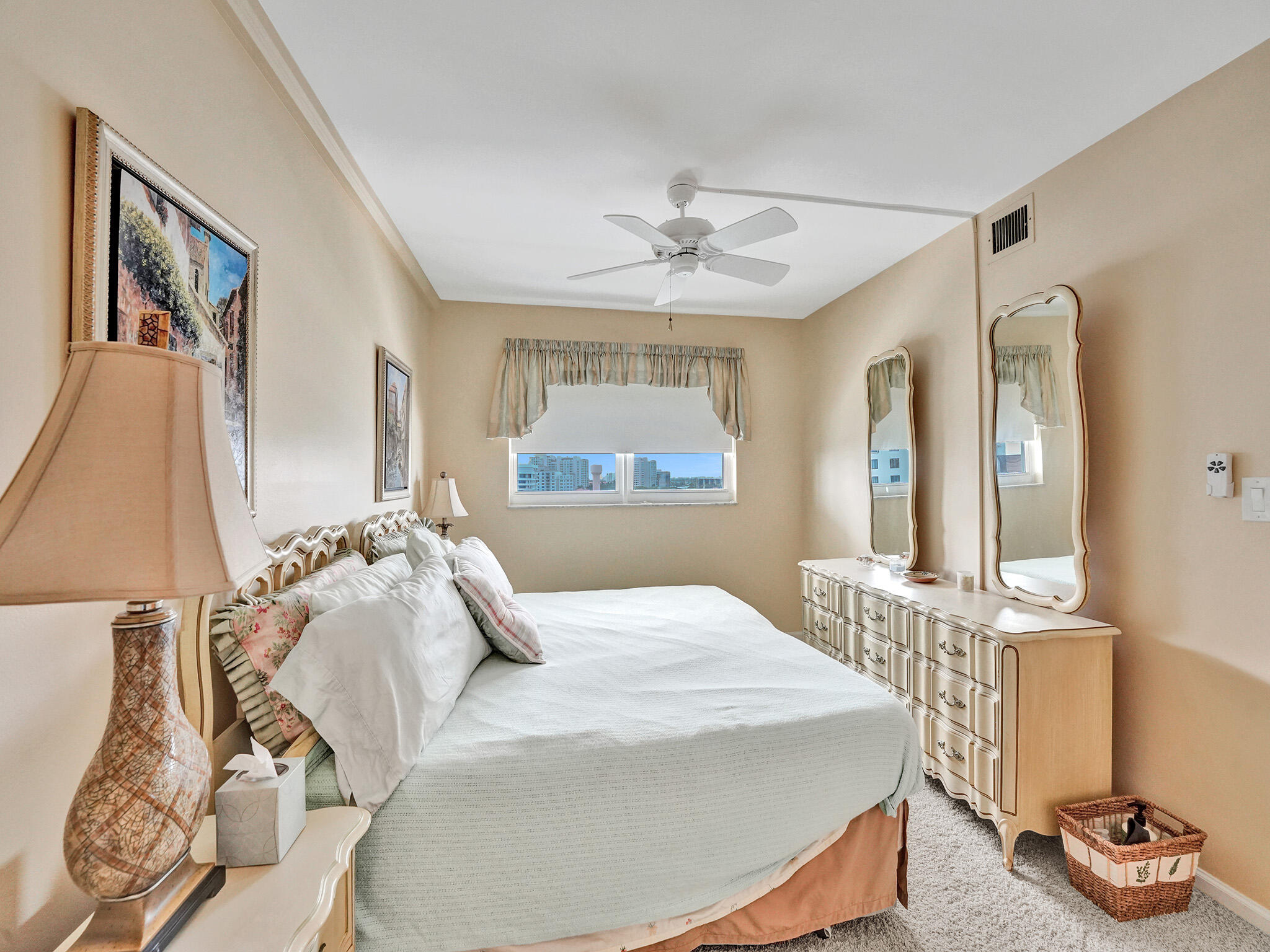 3300 South Ocean Boulevard, Unit 1021C Highland Beach, FL 33487 - Photo 12 of 45 a bedroom with a bed and wooden floor