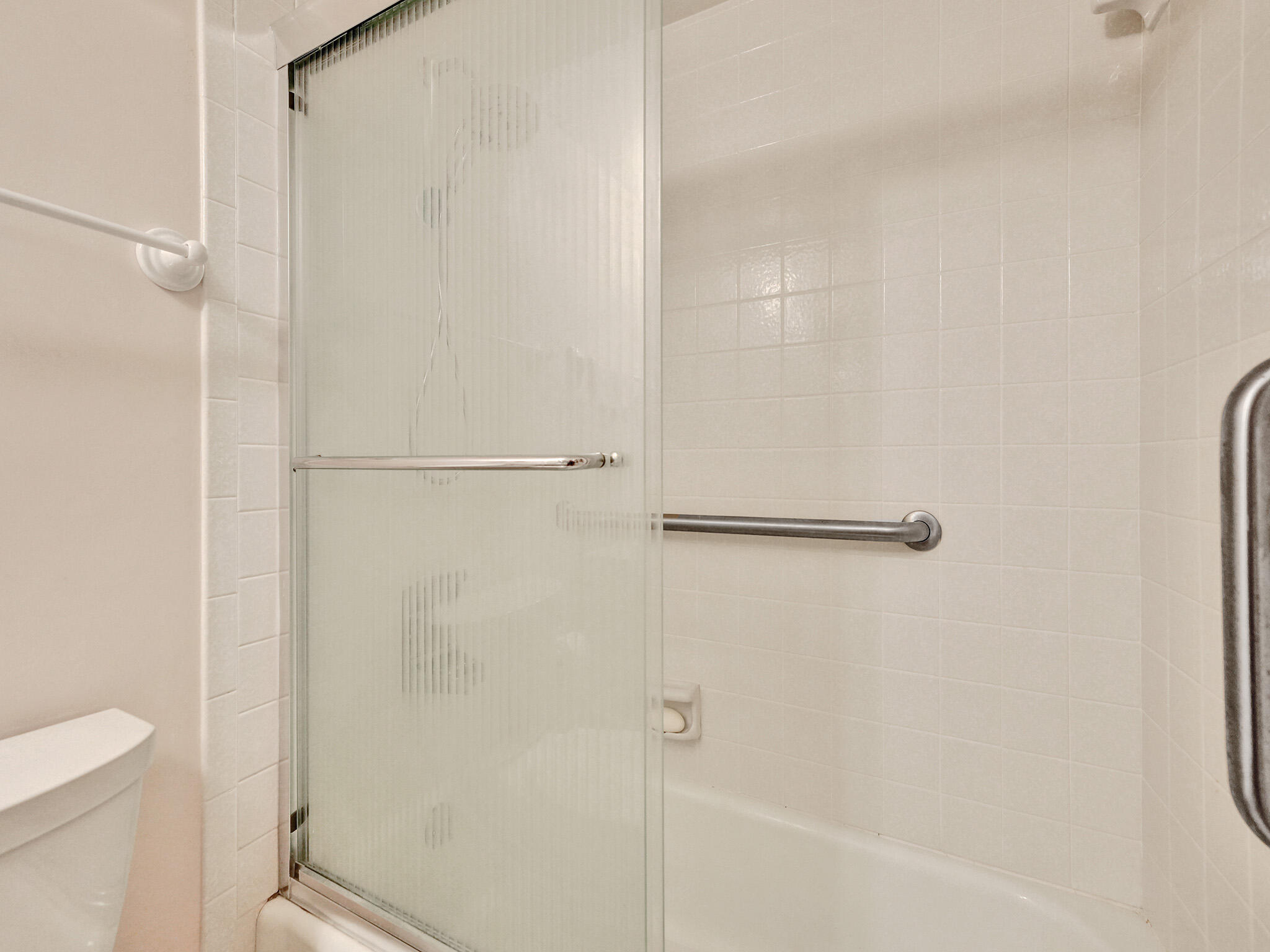 3300 South Ocean Boulevard, Unit 1021C Highland Beach, FL 33487 - Photo 14 of 45 a bathroom with a shower and a toilet