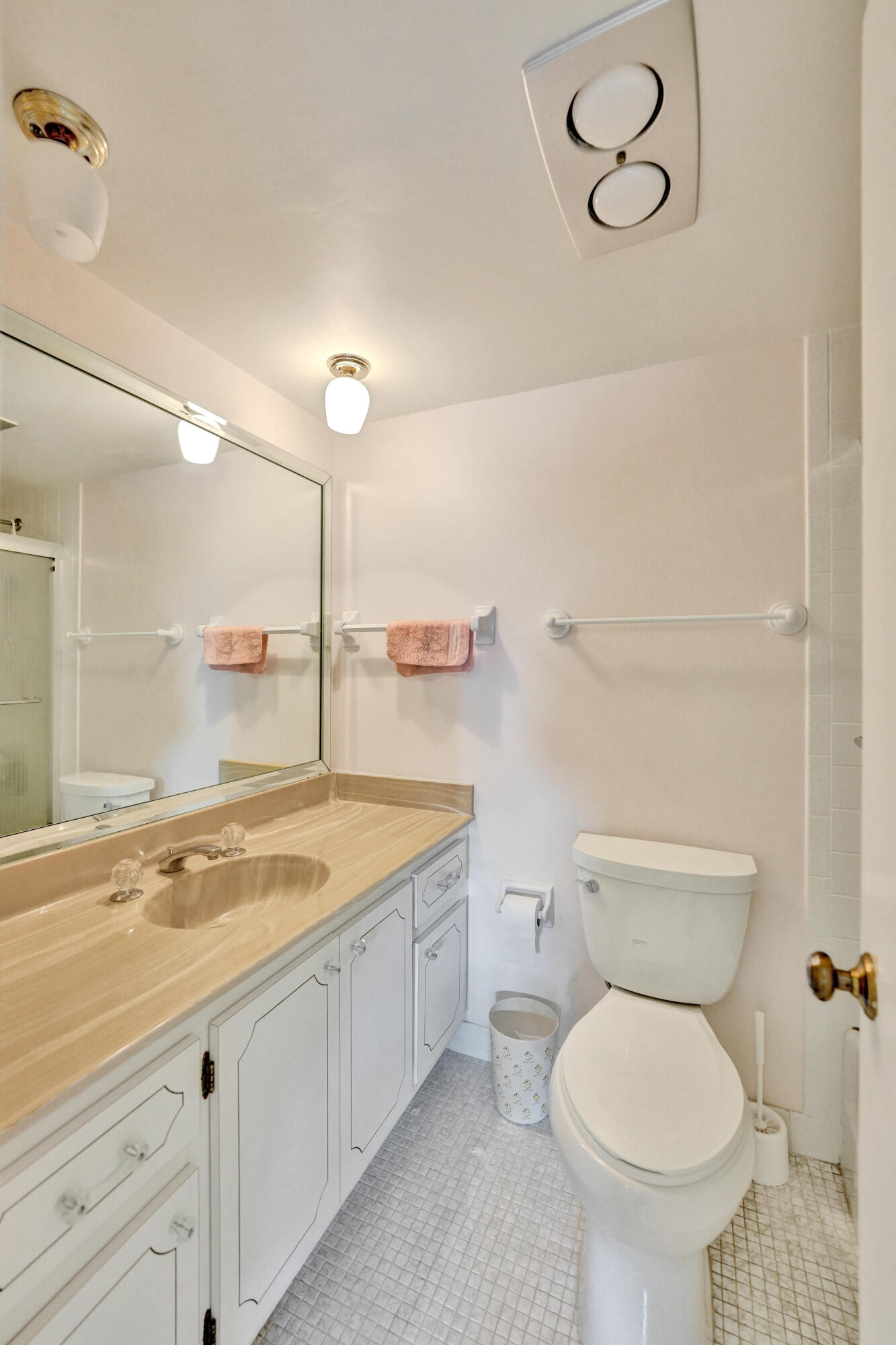 3300 South Ocean Boulevard, Unit 1021C Highland Beach, FL 33487 - Photo 15 of 45 a bathroom with a granite countertop toilet sink and mirror