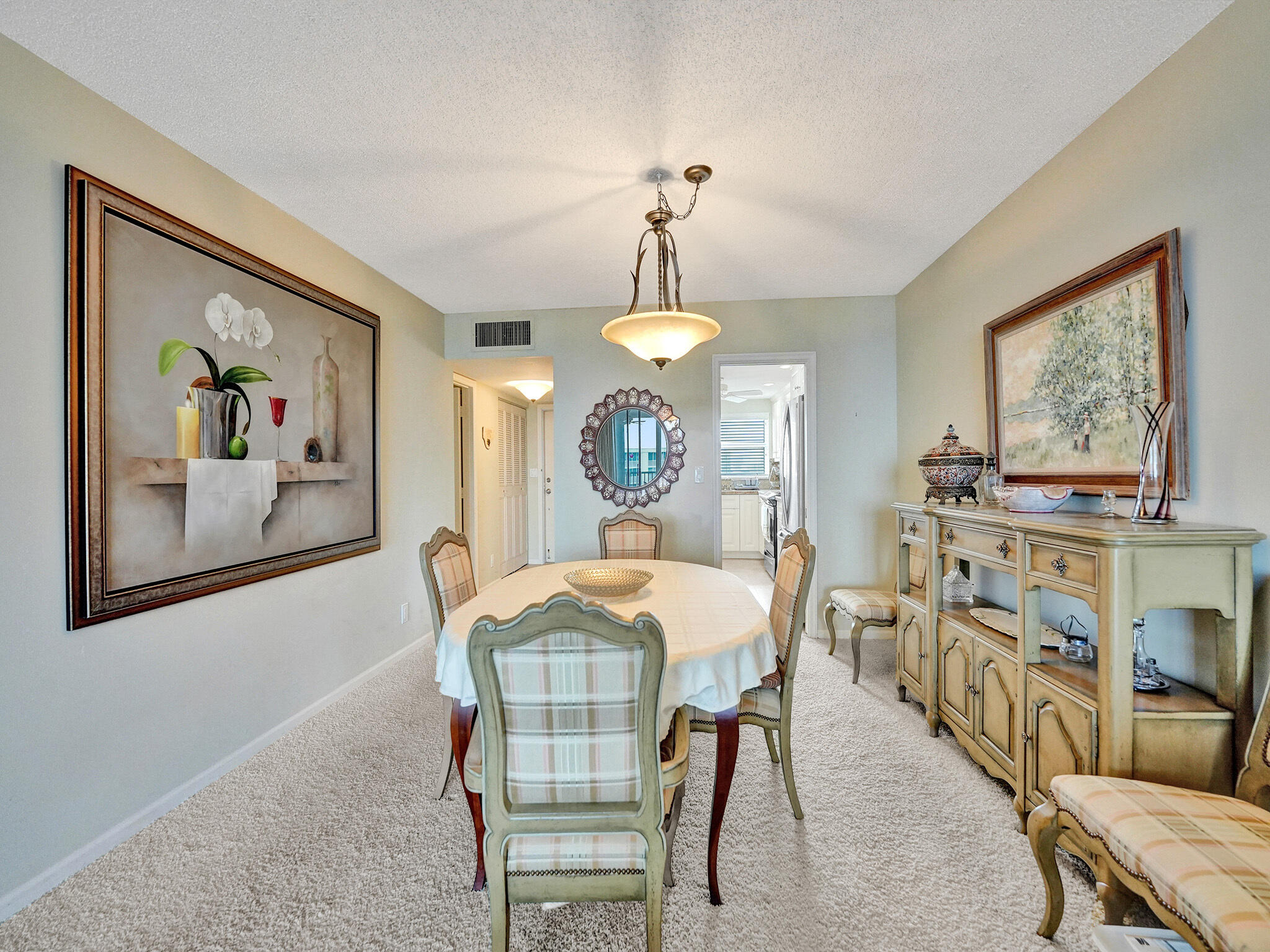 3300 South Ocean Boulevard, Unit 1021C Highland Beach, FL 33487 - Photo 17 of 45 a dining room with furniture and window