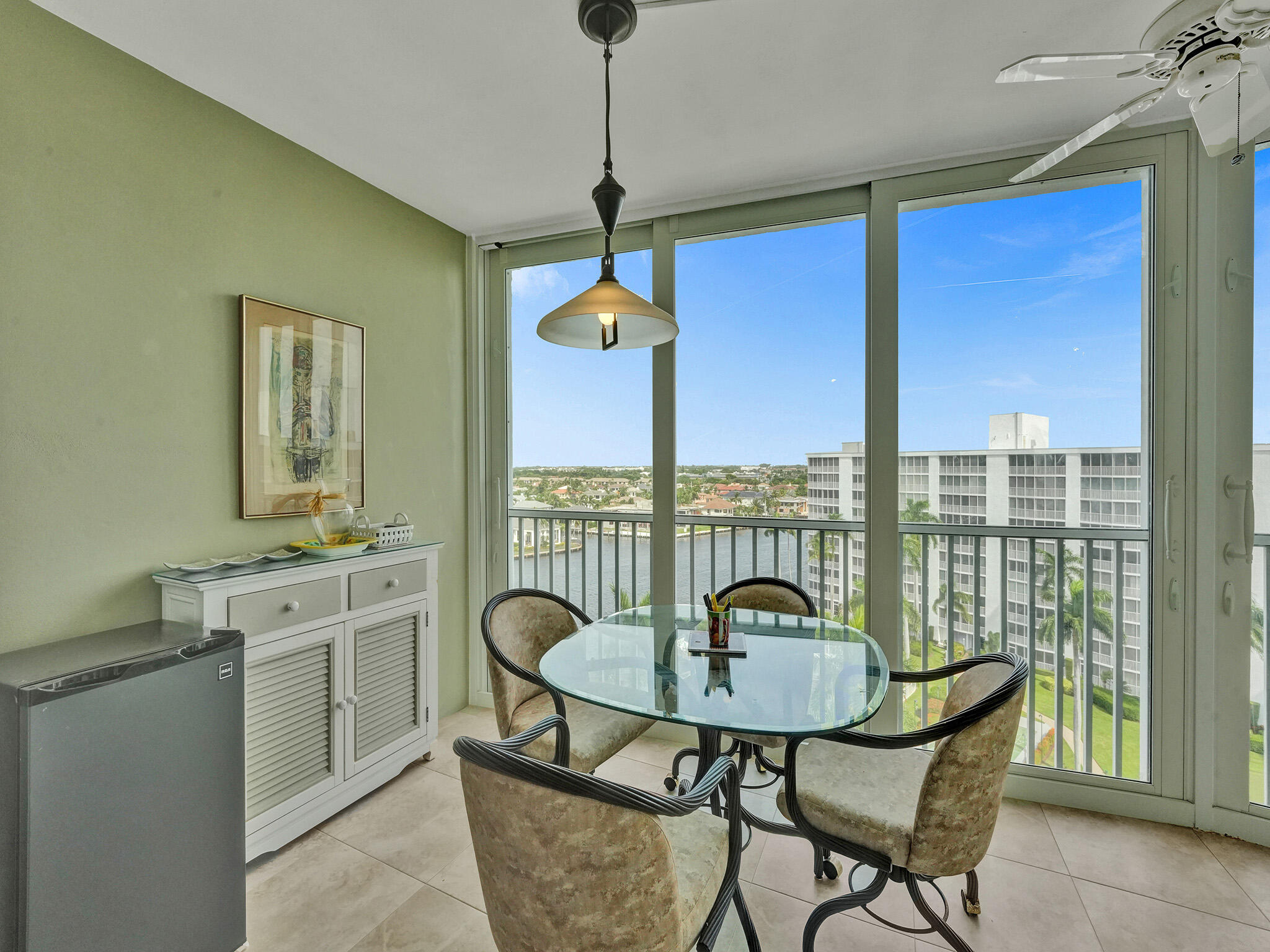 3300 South Ocean Boulevard, Unit 1021C Highland Beach, FL 33487 - Photo 21 of 45 a view of a dining room with furniture window and outside view