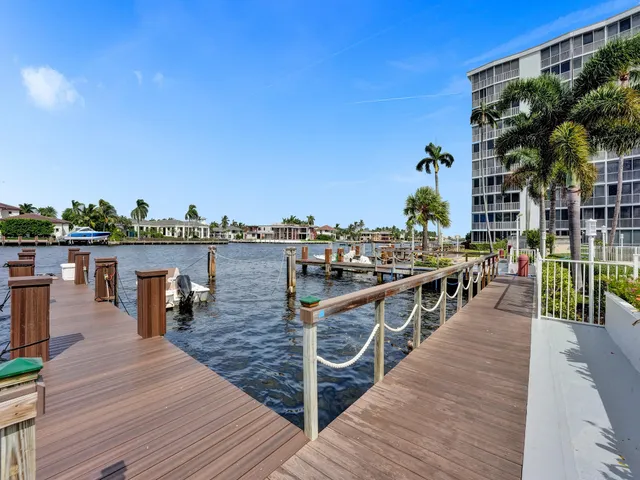 a terrace with outdoor seating and city view